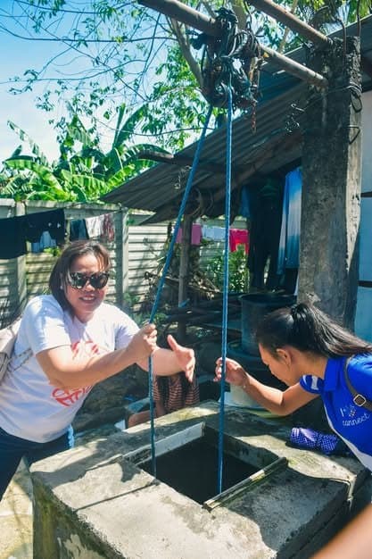 MCOF volunteers serving a local family during outreach