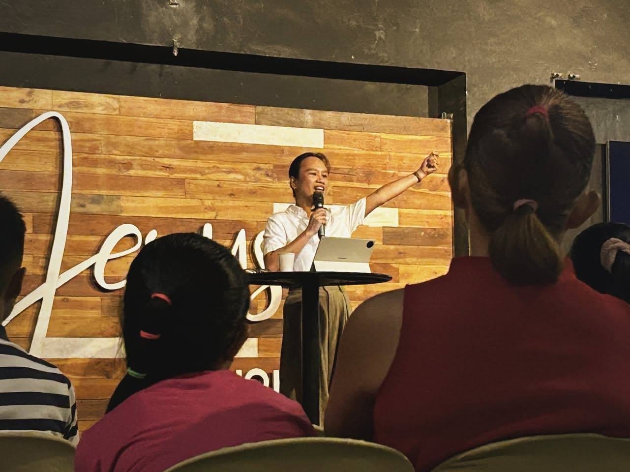 A pastor preaching at the MCOF pulpit