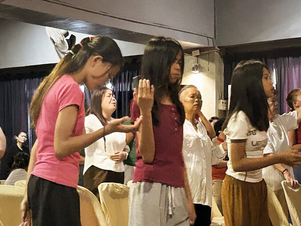 Young people worshipping at MCOF